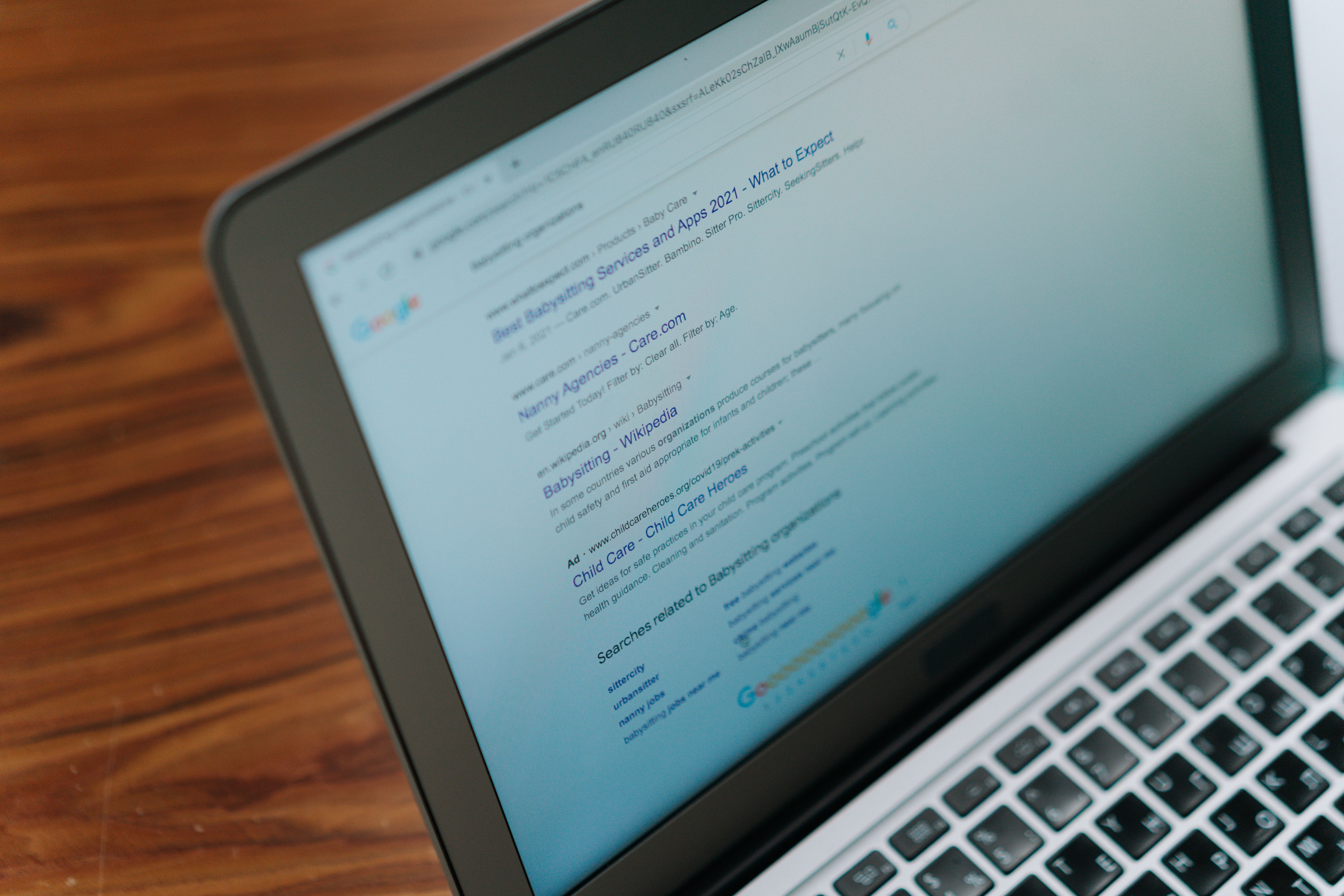 Laptop showing a search engine results page illustrating SEO ranking